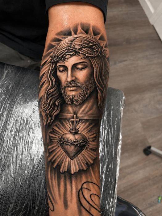 Black and grey Jesus Sacred Heart tattoo by Fargo Tattoo